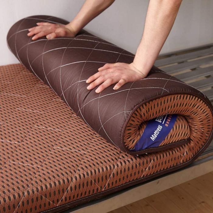 Sleeping mattress on floor